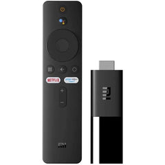 photo of Xiaomi TV Stick 2K with stick and remote on the side